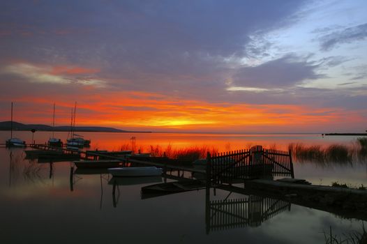 Small boats at sunrise lake Balaton, Hungary