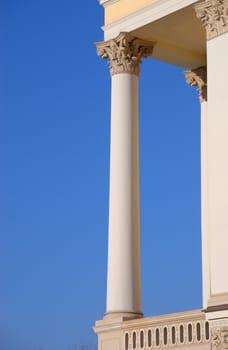 Ancient column on a blue background.