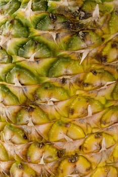 A whole pineapple isolated on a white background.