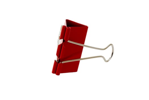 A red binder clip isolated on white with clipping path.