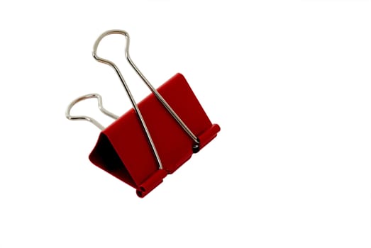 A red binder clip isolated on white with clipping path.