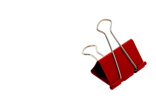 A red binder clip isolated on white with clipping path.