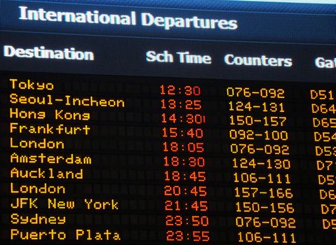 Canadian airport information board, international departures.