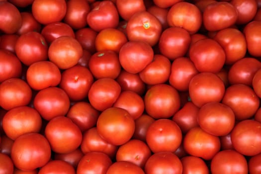 Tomatoes background texture.