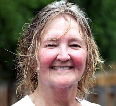 Mature irish woman posing outside.