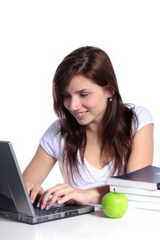 An attractive student studying. All on white background. 