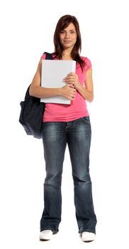 An attractive student standing in front of a plain white background. 