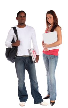 Two attractive students standing in front of plain white background. 