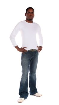 An attractive dark-skinned man standing in front of plain white background. 