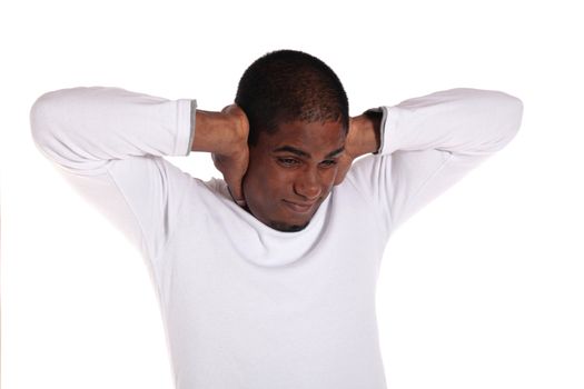 An attractive dark-skinned man suffering from tinnitus. All on white background. 