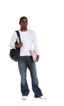An attractive dark-skinned student standing in front of a plain white background.