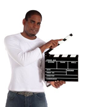 An attractive dark-skinned man using a clapperboard. All on white background.