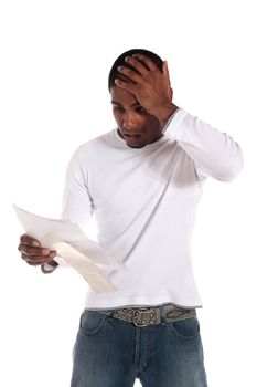 An attractive dark-skinned man getting bad news via mail. All on white background.