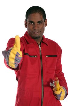 An ambitious dark-skinned worker making a positive gesture. All on white background.