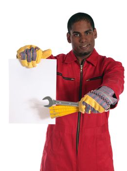 An attractive dark-skinned worker pointing at a blank sheet of paper. All on white background. Sheet kept blank for individual text.