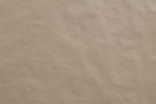 A brown background texture of packing paper.