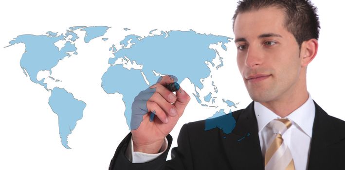 A handsome businessman presenting concepts of global market expansion. All on white background.