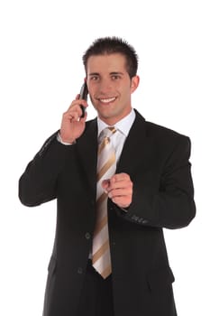 A handsome businessman talking on the phone. All on white background.