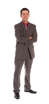 Full length shot of a confident businessman standing in front of a plain white background.