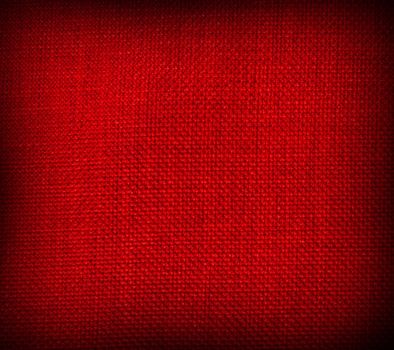 red background with a crisscross mesh pattern