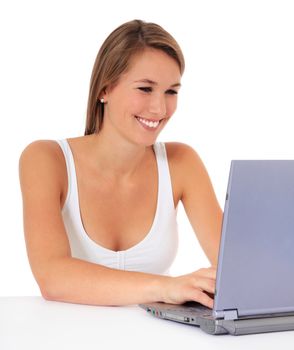 Attractive young woman surfing the internet. All on white background.