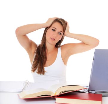 Frustrated student sitting infront of her computer at a desk. All on white background.