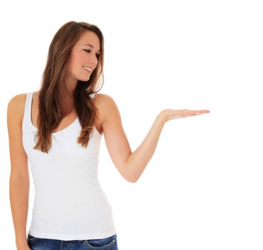 Attractive young woman presenting something. All on white background.