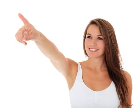 Attractive young woman pointing to the side. All on white background.