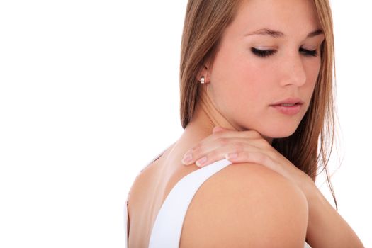 Attractive young woman suffers from neck pain. All on white background.