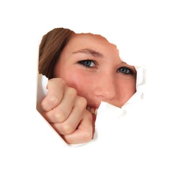 Female person looking through torn hole in white wall. All on white background.