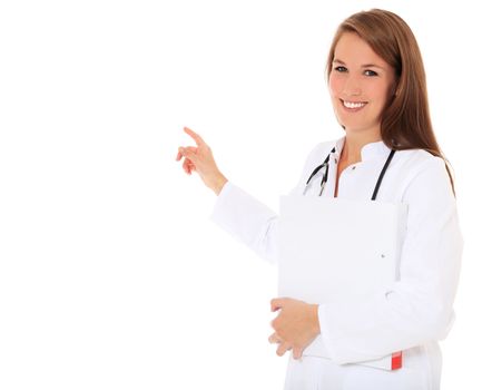 Attractive doctor pointing to the side. All on white background.