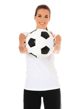 Attractive young woman in sports wear holding soccer ball. All on white background.