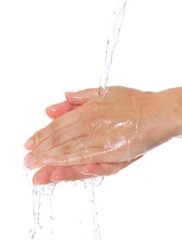 Female person washes her hands. All on white background.