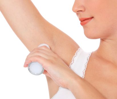 Female person using roll-on. All on white background.