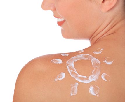 Shoulder of an attractive young woman with sun out of white lotion. All on white background.