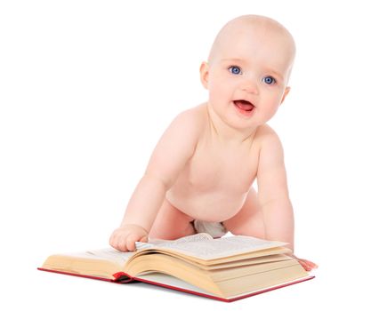 Newborn child playing with a book. All isolated on white background.