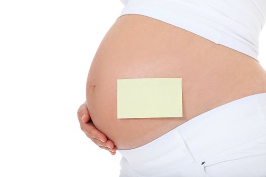 Pregnant woman with blank post-it note. All on white background.
