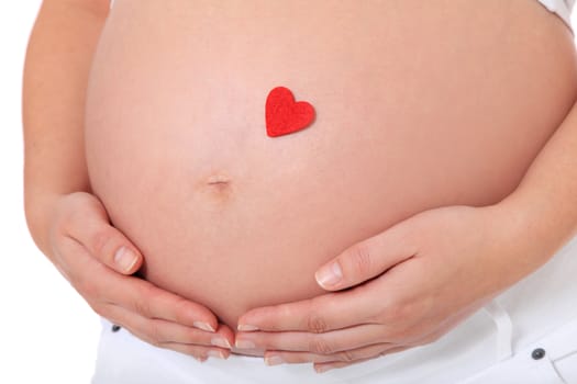 Pregnant woman with single red heart on her baby bump. All on white background.
