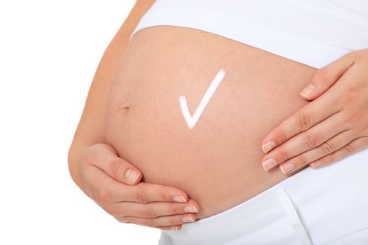 Pregnant woman with checkmark on her baby bump. All on white background.