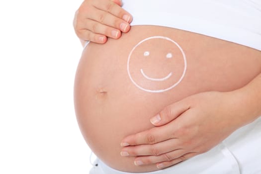 Pregnant woman with smiling face on baby bump. All on white background.