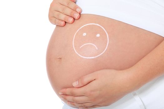 Pregnant woman with sad face on her baby bump. All on white background.