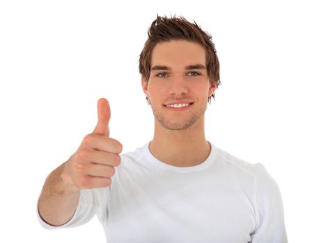 Attractive young man showing thumbs up. All on white background.