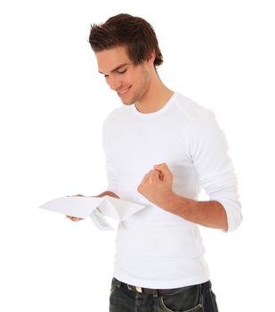Attractive young man getting good news. All on white background.