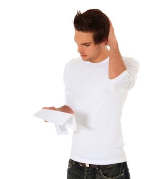 Attractive young man getting bad news. All on white background.