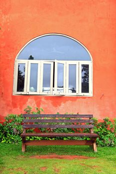 wooden chair with windows on Italian style building