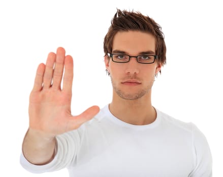 Young guy with repelling gesture. All on white background.