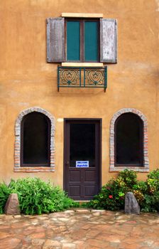 Italian style Window and Door of building with pavemwnt