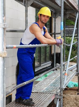 Manual worker on construction site.