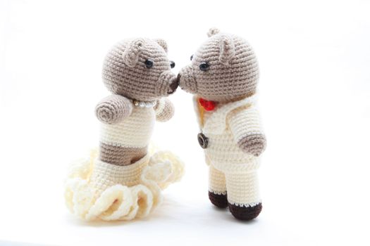 couples of bride and groom bears kiss and getting married isolated on white