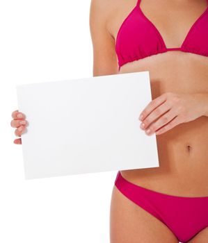 Attractive young woman in bikini holding blank white sign. All on white background.